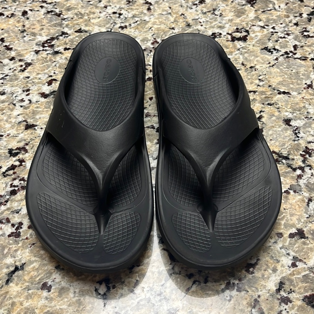 OOFOS recovery sandals.